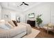 Relaxing main bedroom featuring soft textures, neutral tones, plush rug, and hardwood flooring at 777 Halifax Ave, Winter Park, FL 32792