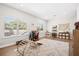 Spacious playroom or bonus room filled with natural light, featuring hardwood floors and ample storage options at 777 Halifax Ave, Winter Park, FL 32792