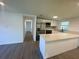 Modern kitchen featuring stainless steel appliances and a breakfast bar at 804 Starke Lake Cir, Ocoee, FL 34761