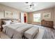 Guest bedroom with hardwood floors and window at 119 Lake Dr, Oviedo, FL 32765