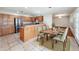 Kitchen dining area with wood table and chairs at 119 Lake Dr, Oviedo, FL 32765