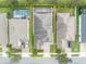 Aerial view of house and surrounding neighborhood, including pool at 15583 Hamlin Blossom Ave, Winter Garden, FL 34787