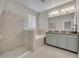 Spa-like bathroom with a large shower, garden tub, and double vanity at 15583 Hamlin Blossom Ave, Winter Garden, FL 34787