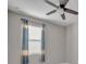 Simple bedroom with window, blinds and ceiling fan at 15583 Hamlin Blossom Ave, Winter Garden, FL 34787