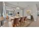 Bright dining room with modern table and chairs at 15583 Hamlin Blossom Ave, Winter Garden, FL 34787