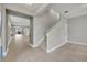 Bright entryway with tile floors and view of the living area at 15583 Hamlin Blossom Ave, Winter Garden, FL 34787