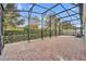 Spacious screened patio with paver floor at 15583 Hamlin Blossom Ave, Winter Garden, FL 34787