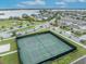 Community tennis courts with surrounding landscape at 15583 Hamlin Blossom Ave, Winter Garden, FL 34787