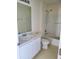 Clean bathroom with tub, toilet and vanity at 3040 Jollett Ct, Deltona, FL 32738