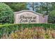 Entrance sign to Reserve at Loch Lake surrounded by lush landscaping at 2129 Victoria Glen Dr, Sanford, FL 32773