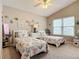 Two twin beds in a sunny bedroom with beachy decor at 3904 Plantation Blvd, Leesburg, FL 34748