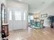 Home entryway with tile floors and a dining room view at 3904 Plantation Blvd, Leesburg, FL 34748