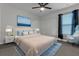 Serene bedroom featuring a king-size bed, calming decor, and a comfortable armchair at 12037 Imaginary Way, Orlando, FL 32832