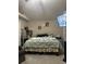 Bright bedroom with a king-size bed and stylish wall art at 1241 Melontree Ct # 6, Gotha, FL 34734