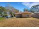 View of the backyard and rear of the home at 1740 Palm Rd, Ormond Beach, FL 32174