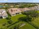 Aerial view of house and expansive backyard with a garden at 3814 Golden Feather Way, Kissimmee, FL 34746