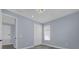 Bright bedroom with hardwood floors and neutral walls at 3814 Golden Feather Way, Kissimmee, FL 34746