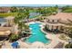 Irregular shaped pool with water slide and plenty of lounge chairs at 3814 Golden Feather Way, Kissimmee, FL 34746