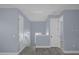 Upstairs hallway with doors to bedrooms and bath at 3814 Golden Feather Way, Kissimmee, FL 34746