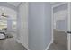 Hallway with access to the main bedroom suite at 3814 Golden Feather Way, Kissimmee, FL 34746