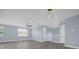 Bright and airy loft area, featuring hardwood floors and a ceiling fan at 3814 Golden Feather Way, Kissimmee, FL 34746