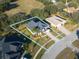 Two-story house aerial view, showcasing a large backyard and neighborhood setting at 4431 Rock Hill Loop, Apopka, FL 32712