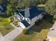 Aerial view of house, highlighting the home's side and driveway at 4431 Rock Hill Loop, Apopka, FL 32712