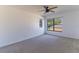 Bright bedroom with large window and carpet flooring at 4431 Rock Hill Loop, Apopka, FL 32712