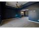 Dark-blue bedroom with ceiling fan and carpet flooring at 4431 Rock Hill Loop, Apopka, FL 32712