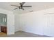 Spacious bedroom featuring a ceiling fan and ensuite bathroom with a neutral color palette at 4431 Rock Hill Loop, Apopka, FL 32712