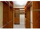 Large walk-in closet with double hanging rods and drawers at 4431 Rock Hill Loop, Apopka, FL 32712