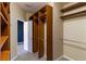 Spacious closet with shelves, rods, and access to bedroom at 4431 Rock Hill Loop, Apopka, FL 32712