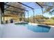 Beautiful private screened in pool with spa and outdoor kitchen area at 4431 Rock Hill Loop, Apopka, FL 32712