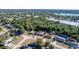 Aerial view of the property, showing its location and surrounding landscape with mature trees and privacy at 1269 Buccaneer Ave, Deltona, FL 32725