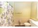 Bathroom boasts a shower with updated fixtures and tiled floors at 1269 Buccaneer Ave, Deltona, FL 32725