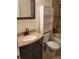 Clean bathroom with a vanity, toilet, and shower/tub at 3193 W Central Blvd, Orlando, FL 32805