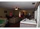 Overhead view of the living room, with vintage furniture and access to other parts of the home at 3555 E Johnson Ave, Haines City, FL 33844