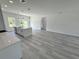 Spacious open-plan kitchen featuring a central island and plenty of natural light at 6421 Sw 151St Loop, Ocala, FL 34473