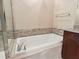 Relaxing bathroom with soaking tub and shower at 100 S Eola Dr # 608, Orlando, FL 32801