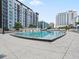 Resort-style swimming pool with surrounding deck at 100 S Eola Dr # 608, Orlando, FL 32801