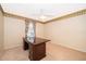 Neutral room with carpeted floors, a decorative border and a vintage wooden desk at 516 Yellow Tail Pl, Chuluota, FL 32766