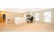 Bright bonus room area with neutral walls, carpeted floor, and natural light at 516 Yellow Tail Pl, Chuluota, FL 32766