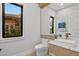 Modern powder room with floating vanity and designer fixtures at 5762 Emerington Cres, Orlando, FL 32819