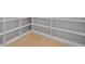 Empty built-in shelving unit with light gray finish at 5762 Emerington Cres, Orlando, FL 32819