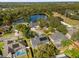 Single-Gathering home with solar panels and a screened pool near a lake at 1657 Carillon Park Dr, Oviedo, FL 32765