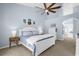 Spacious bedroom with king-size bed and ensuite bathroom access at 1657 Carillon Park Dr, Oviedo, FL 32765