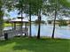 Community gazebo on a pier overlooking a lake with fountain at 1657 Carillon Park Dr, Oviedo, FL 32765