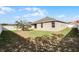 Home with a fenced backyard and a grassy area at 326 Highland Meadows Ave, Davenport, FL 33837