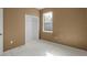 Small bedroom with closet and neutral walls at 326 Highland Meadows Ave, Davenport, FL 33837