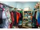 Well-organized closet with shelving and hanging rods at 326 Highland Meadows Ave, Davenport, FL 33837